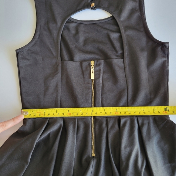 Black Open Back Peplum Top - Picture 8 of 10